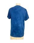 A beautiful blue hand dyed t shirt with a star motif back view.