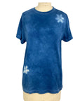 A beautiful blue hand dyed t shirt with a star motif front view.