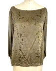 The olive green Lucia top naturally dyed floral print shown on a dress form, front view