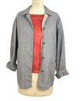 The red Lucia top naturally dyed floral print shown styled with a jacket and scarf
