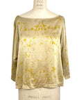 The yellow Lucia top naturally dyed floral print shown on a dress form, front view