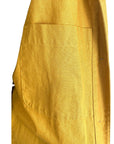 The sunrise jacket in yellow cotton linen fabric shown on a dress form, fabric detail