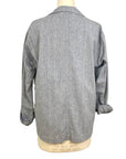 The sunrise jacket in light grey organic cotton and hemp shown on a dress form, back view