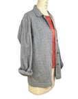 The sunrise jacket in light grey organic cotton and hemp shown on a dress form, side view