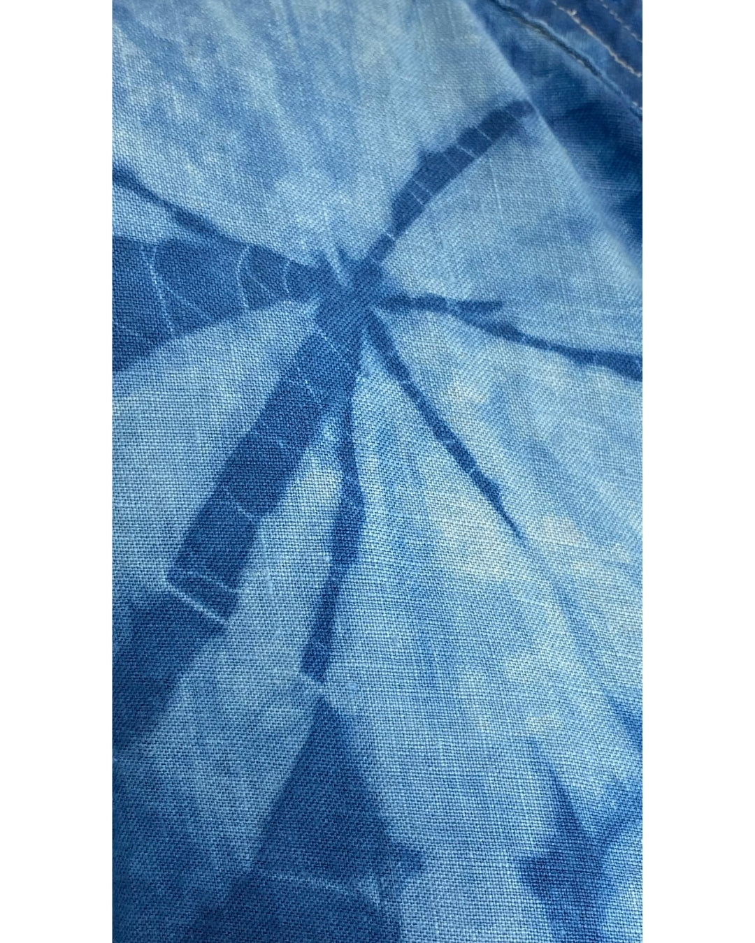 A beautiful long linen jacket in blue detail.