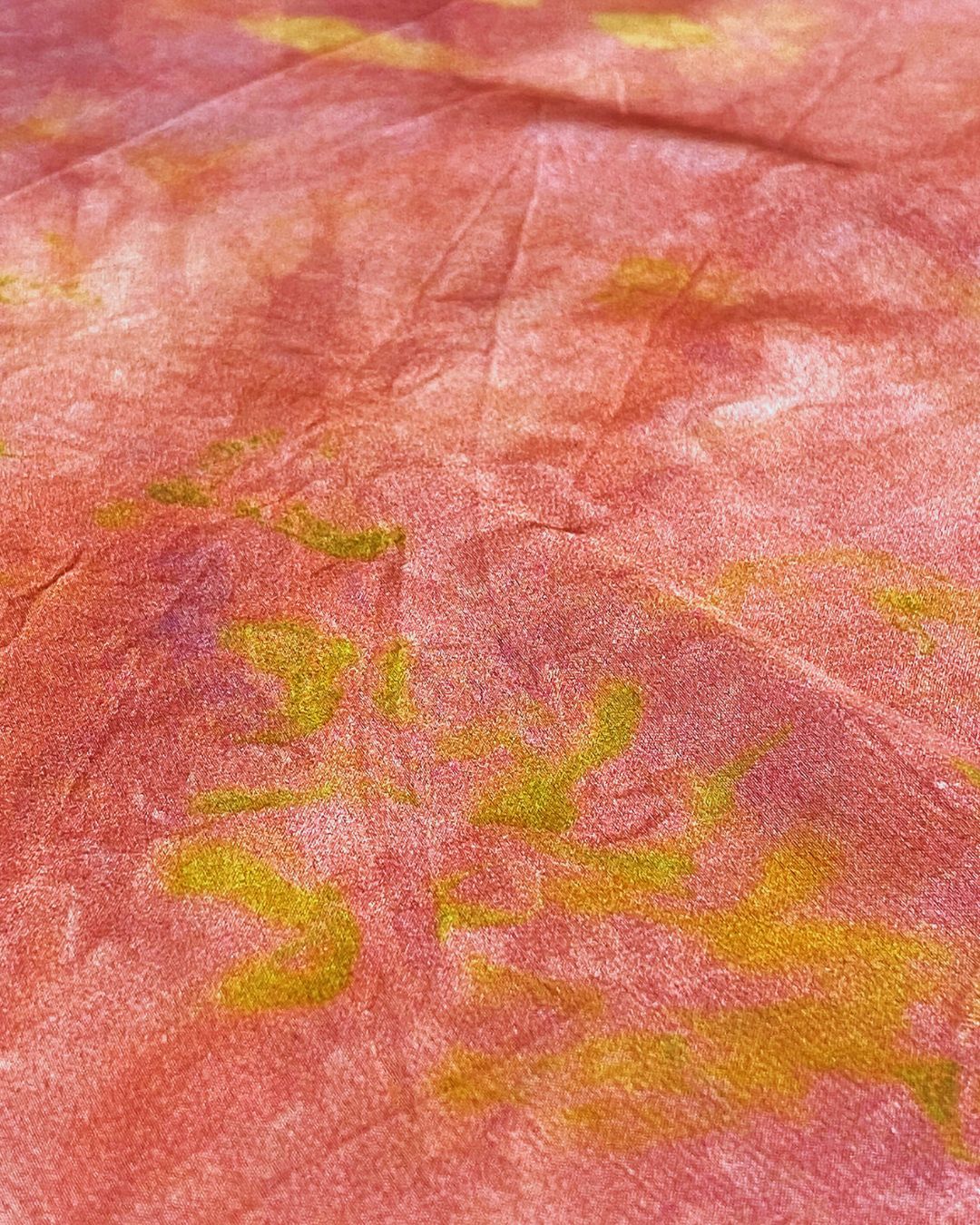 A large square silk rose scarf naturally dyed floral print detail