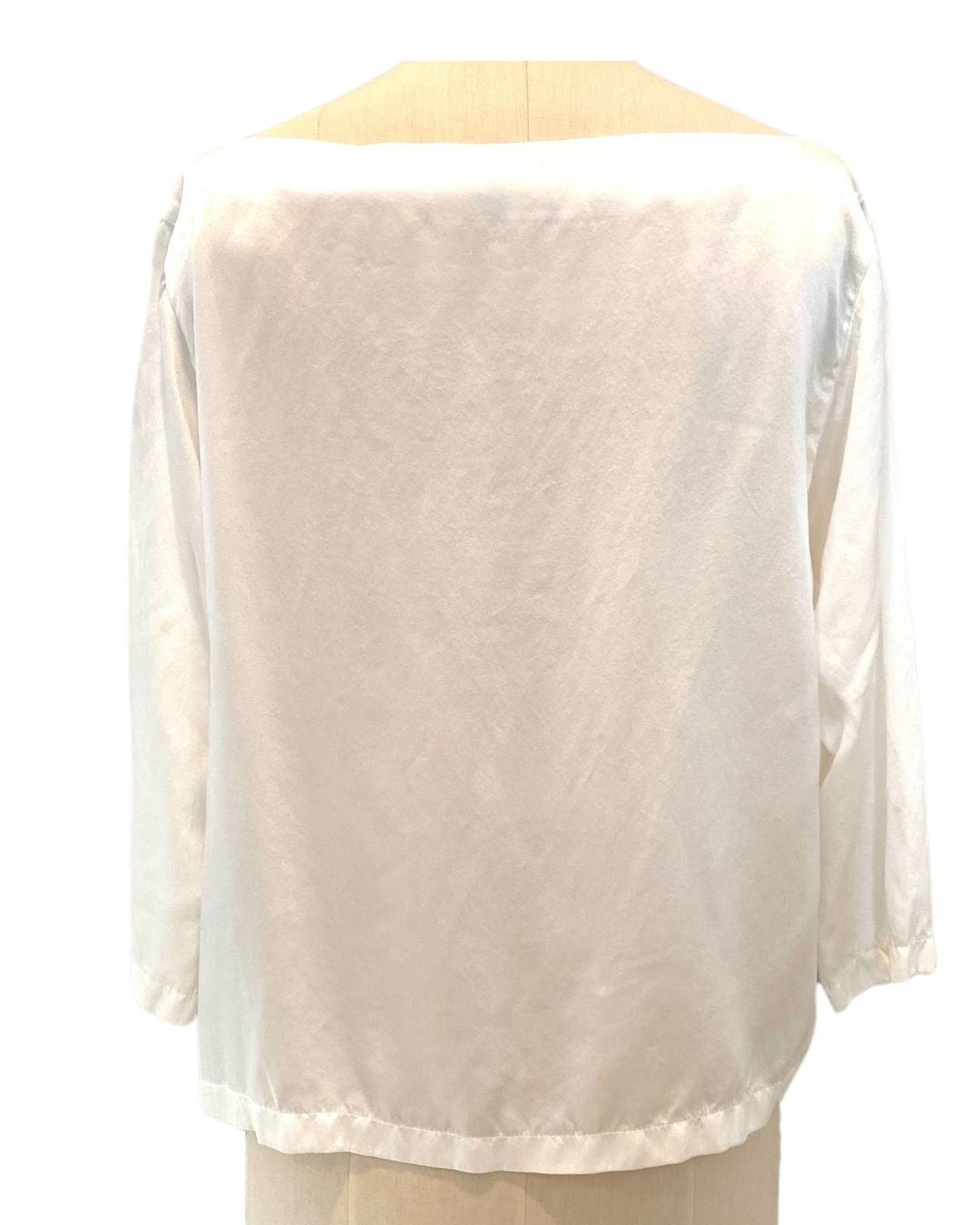 The white Lucia top back view