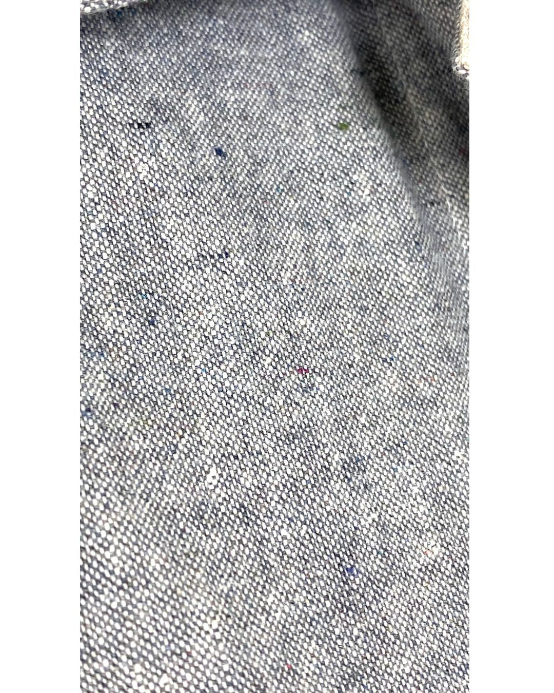 The sunrise jacket in light grey organic cotton and hemp shown on a dress form, detail